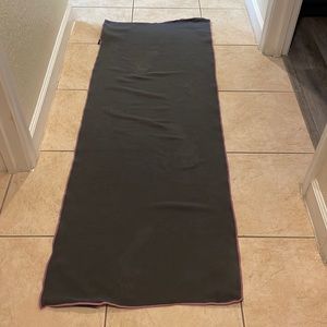 Grey with purplish trip yoga mat towel with pockets for the corners of your mat
